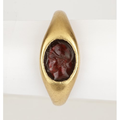 A Roman Gold Set Ring with Garnet Intaglio of Minerva